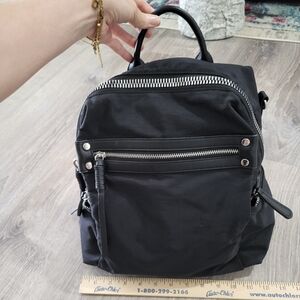 black nylon back pack with silver hardware